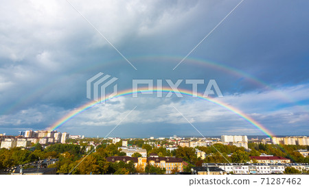 Double rainbow in the sky over the roofs of the resort city of Anapa, Russia Double rainbow in the sky over the roofs of the resort city of Anapa, Russia 71287462