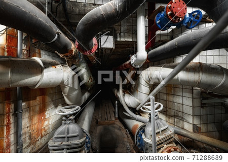 Dark underground tunnel made out of pipes 71288689