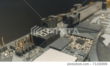 Motherboard close up photo with transistors Motherboard close up photo with transistors 71288906