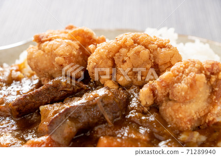 Fried chicken on curry rice. Fried chicken on curry rice. 71289940