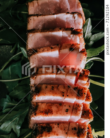 Sesame Crusted Tuna Steak on Arugula 71292184