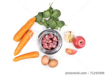 Overhead view of barf raw food ingredients recipe for dogs consisting meat, vegetable and egg Overhead view of barf raw food ingredients recipe for dogs consisting meat, vegetable and egg 71293996