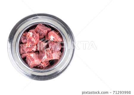 Overhead view on serving of raw barf beef meat chunk for dog meal Overhead view on serving of raw barf beef meat chunk for dog meal 71293998