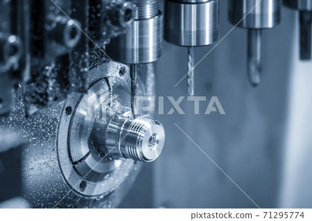 The operation of multi-tasking CNC lathe machine swiss type. 71295774