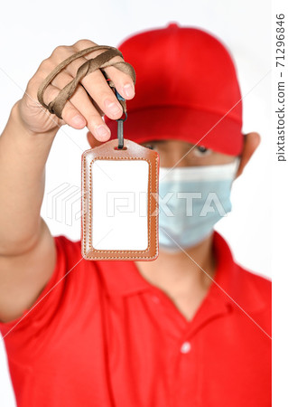 Man holding empty Identification ,white blank employee id card mockup Man holding empty Identification ,white blank employee id card mockup 71296846