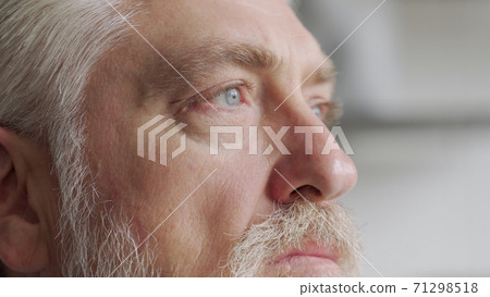 Old man's eyes closeup footage: pensive old man thoughtful elder Old man's eyes closeup footage: pensive old man thoughtful elder 71298518