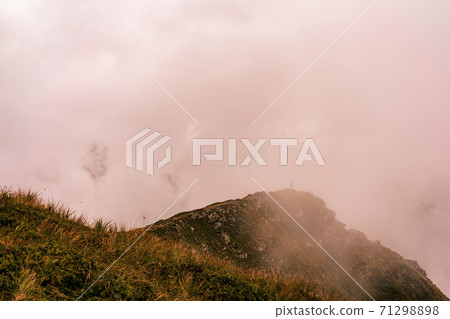 Summer landscape of the Montenegrin ridge, overcast mountain and landscapes of Gutyn Tomnatyk mountain, fascinating and mystical mountains, majestic Carpathians. Summer landscape of the Montenegrin ridge, overcast mountain and landscapes of Gutyn Tomnatyk mountain, fascinating and mystical mountains, majestic Carpathians. 71298898