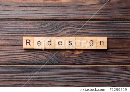 REDESIGN word made with wooden blocks concept 71299329