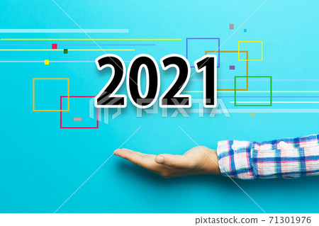 2021 concept with hand 71301976