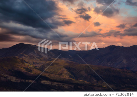 Aerial View of Scenic Landscape and Mountains on a Cloudy Fall Season Aerial View of Scenic Landscape and Mountains on a Cloudy Fall Season 71302014