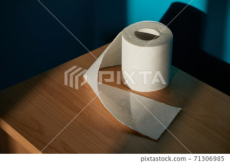 Toilet paper on shelf un sunlight Toilet paper on shelf un sunlight 71306985