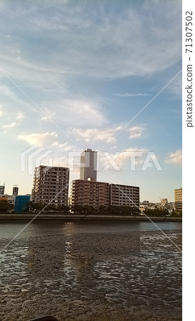 Sky and low tide river near Miyuki Bridge (Ujina) 71307502