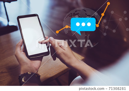 Women hand using smartphone typing, chatting conversation in chat box icons pop up. Social media maketing. Women hand using smartphone typing, chatting conversation in chat box icons pop up. Social media maketing. 71308281