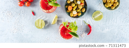 Bloody Mary cocktails panorama, overhead flat lay shot with ingredients 71311473