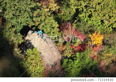 Hiker on rock Hiker on rock 71314430