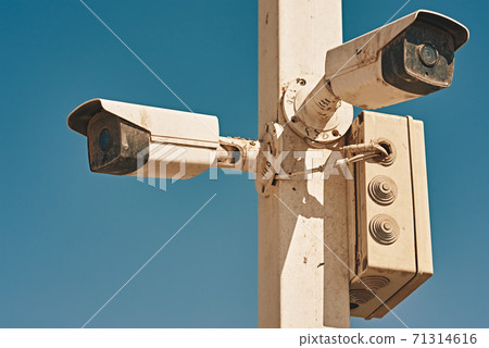 Security and video control CCTV camera, closeup. Surveillance and monitoring concept 71314616