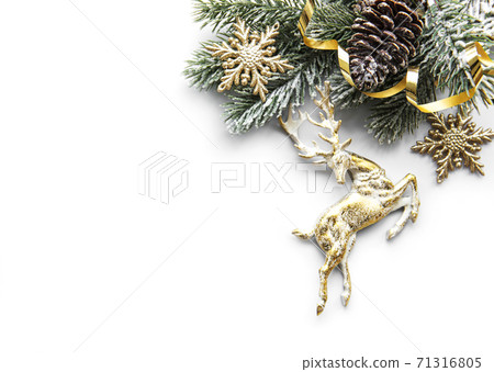 Christmas composition with deer, snowflakes and fir branches. Christmas composition with deer, snowflakes and fir branches. 71316805