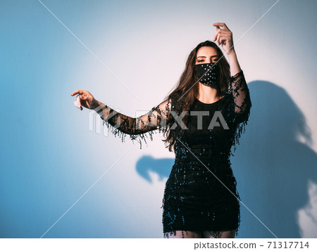 pandemic party night club look woman mask dancing pandemic party night club look woman mask dancing 71317714