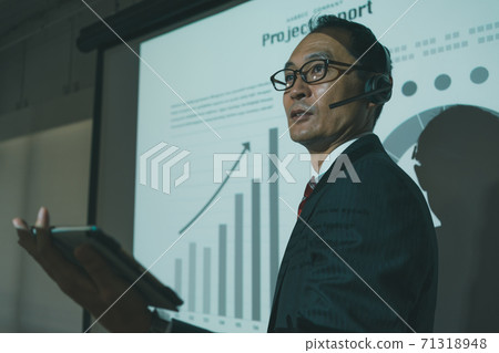 Business presentation Male in fifties Business presentation Male in fifties 71318948