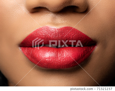 Close up view of beautiful woman lips Close up view of beautiful woman lips 71321237