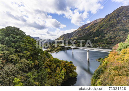 Okawa Dam Komen Bridge seen from the running Aizu Railway train 71321828