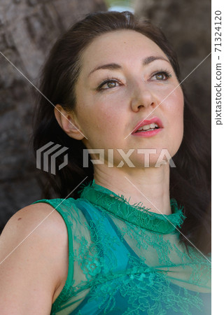 Mature beautiful businesswoman at the park outdoors Mature beautiful businesswoman at the park outdoors 71324120