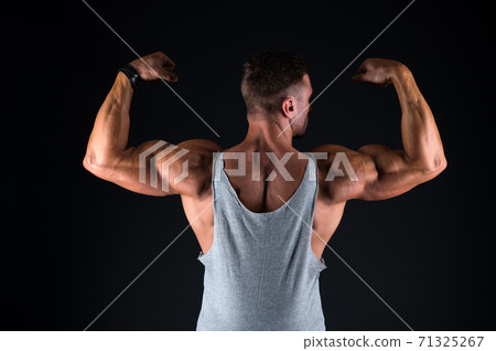 Lets get that body trained. Fit guy flex arms showing biceps triceps. Muscle power. Lets get that body trained. Fit guy flex arms showing biceps triceps. Muscle power. 71325267