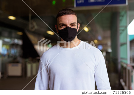 Portrait of man wearing mask and social distancing at the sky train station Portrait of man wearing mask and social distancing at the sky train station 71326566
