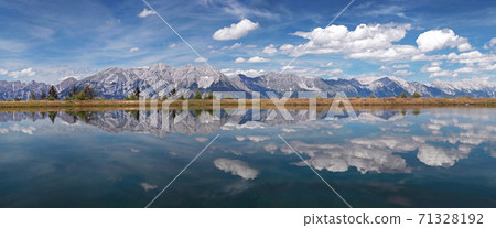 Panoramic lake. Alpine reflection Panoramic lake. Alpine reflection 71328192