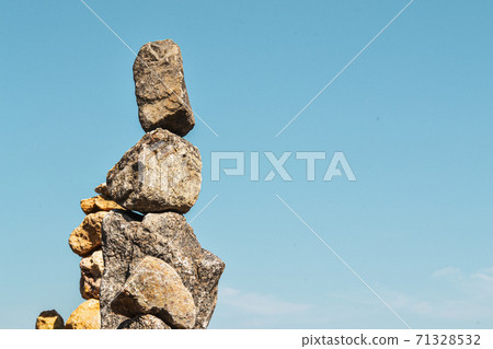 Minimalist aesthetics. Stones against the background of the sky Minimalist aesthetics. Stones against the background of the sky 71328532