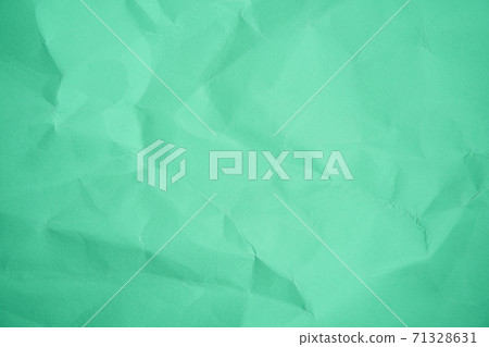 Green Sheet crumpled paper color background  Close up Copy space 71328631