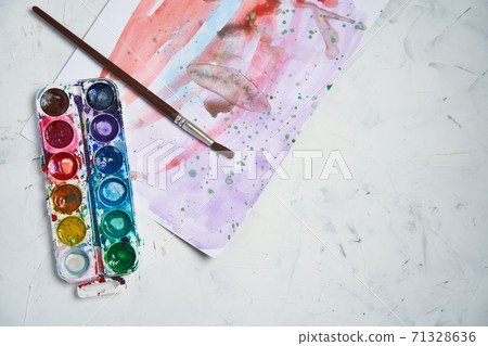 Set of watercolor paints on white background. Brushes drawing. Creative background. School for teaching drawing. 71328636