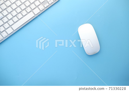 Top view of computer mouse, keyboard on blue background, Top view of computer mouse, keyboard on blue background, 71330228