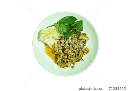 Thai spicy chop pork salad and fresh vegetable on plate 71333615