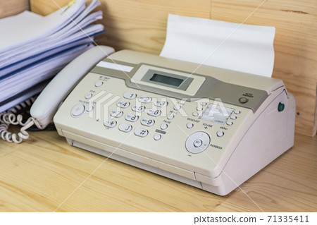 The fax machine for Sending documents in the office 71335411