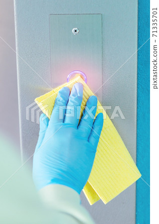 Sanitizing an elevator push button against bacteria and virus. 71335701