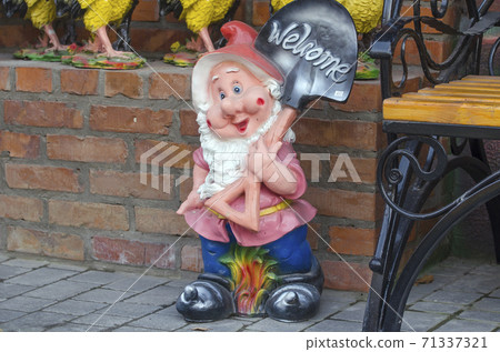 Beautiful, decorative sculpture in the garden. Beautiful, decorative sculpture in the garden. 71337321