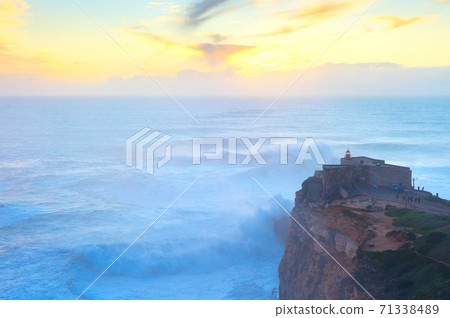 Lighthouse  Nazare Portugal surfing waves 71338489
