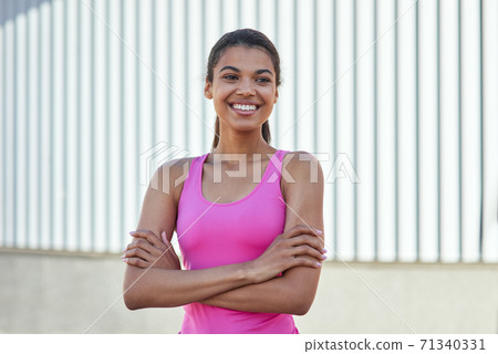 Portrait of mixed race young girl in sportswear 71340331
