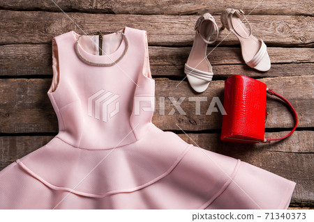 Dress with necklace and purse. Dress with necklace and purse. 71340373