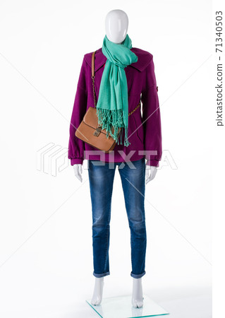 Purple coat with brown bag. Purple coat with brown bag. 71340503
