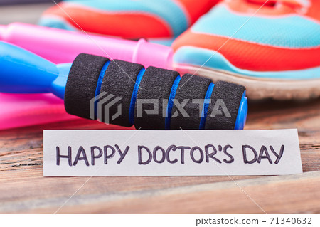 Skipping rope, gumshoes and card. 71340632