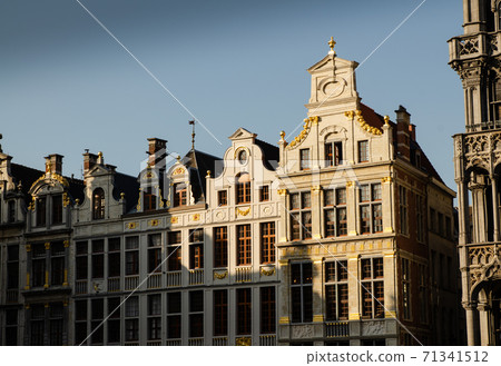Brussels, Belgium, August 2019. The Great Square or Grote Markt. The evening light enhances its beauty of the magnificent Baroque and Gothic buildings. 71341512