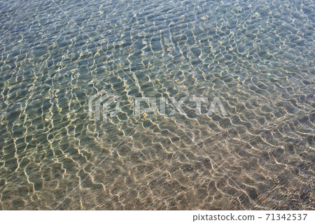 Wave pattern on the beach Wave pattern on the beach 71342537