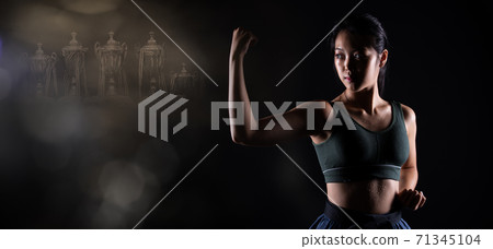 TaeKwonDo Karate teenager athlete kick punch black background isolated 71345104