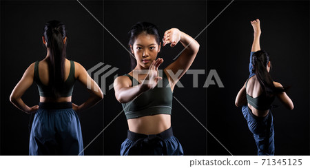 TaeKwonDo Karate teenager athlete kick punch black background isolated 71345125