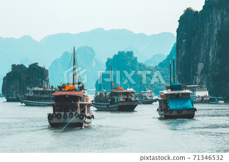 Rock islands near floating village in Halong Bay. Beautiful sea landscape in Ha Long Bay Vietnam 71346532