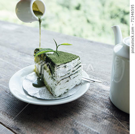green tea cheese cake dessert on wood 71346595