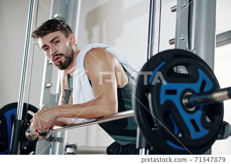 Handsome young bearded sportsman 71347879