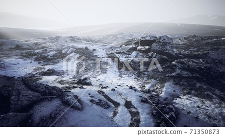 Antarctic mountains with snow in fog 71350873